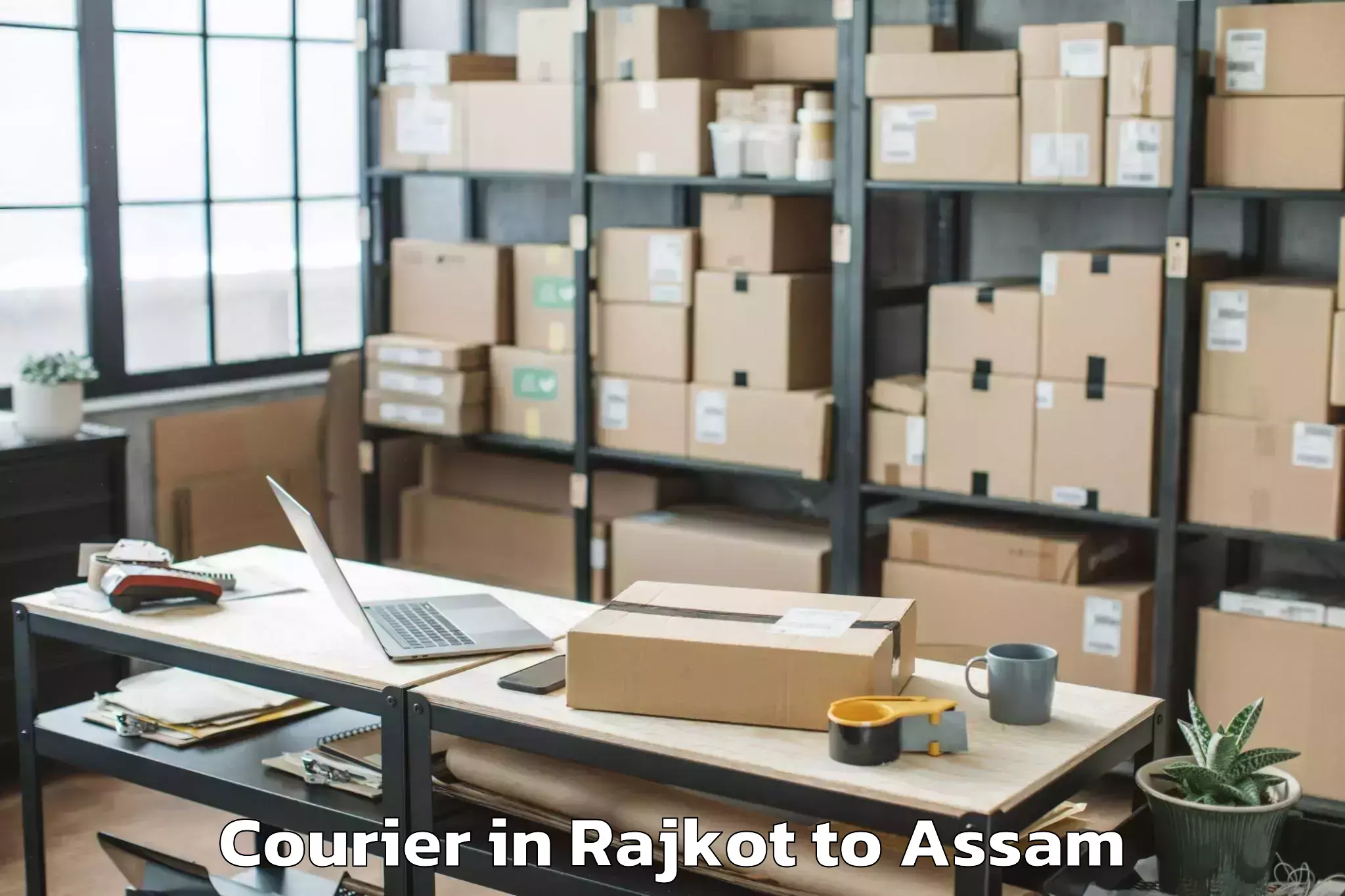 Top Rajkot to Dudhnoi Courier Available